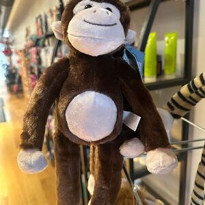Brown and White Stuffed Monkey Toy